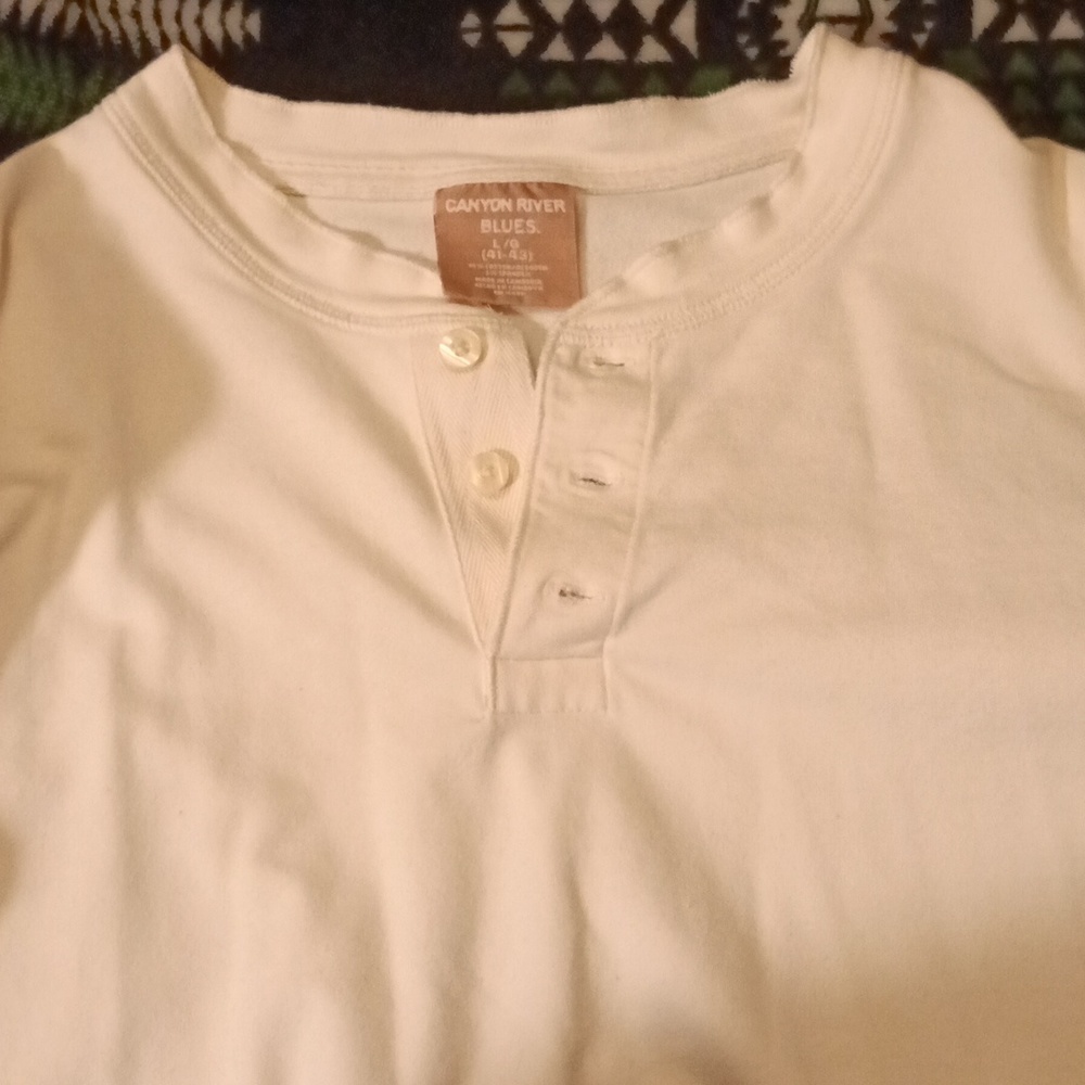 Large canyon River blues long sleeved t-shirt kind of a cream white color